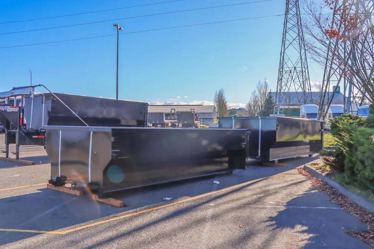 Roll-off dumpster ready for waste disposal at job site for 12 Yard Dumpster Rental in Tyler